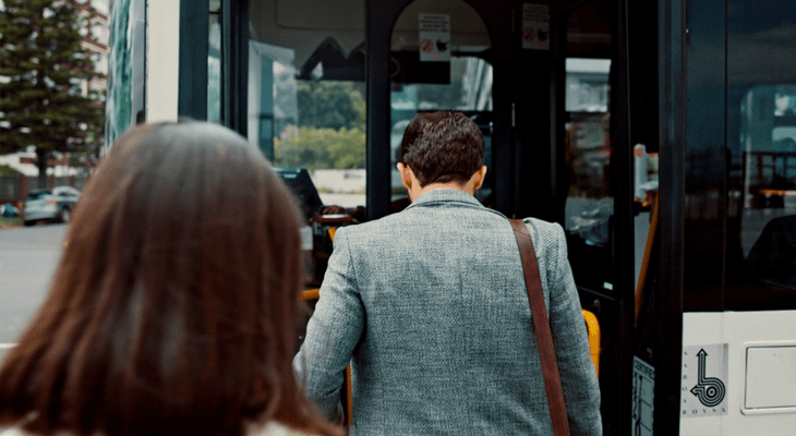 employees board an aurora charter bus